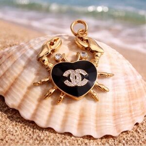 Chanel stamped Gold and Black Crab Pendant/ charm/ zipper pull